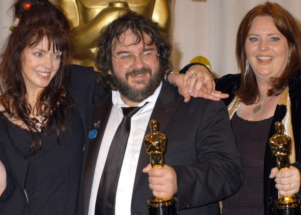 Fran Walsh, Peter Jackson and Philippa Boyens pose with Academy Award