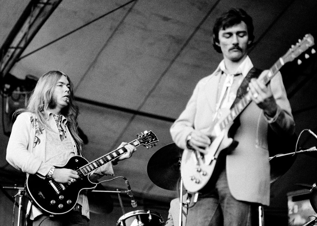 Gregg Allman and Dickey Betts of the Allman Brothers perform live.