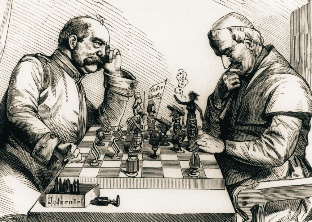 Political illustration showing Otto von Bismarck and Pope Pius IX playing chess.