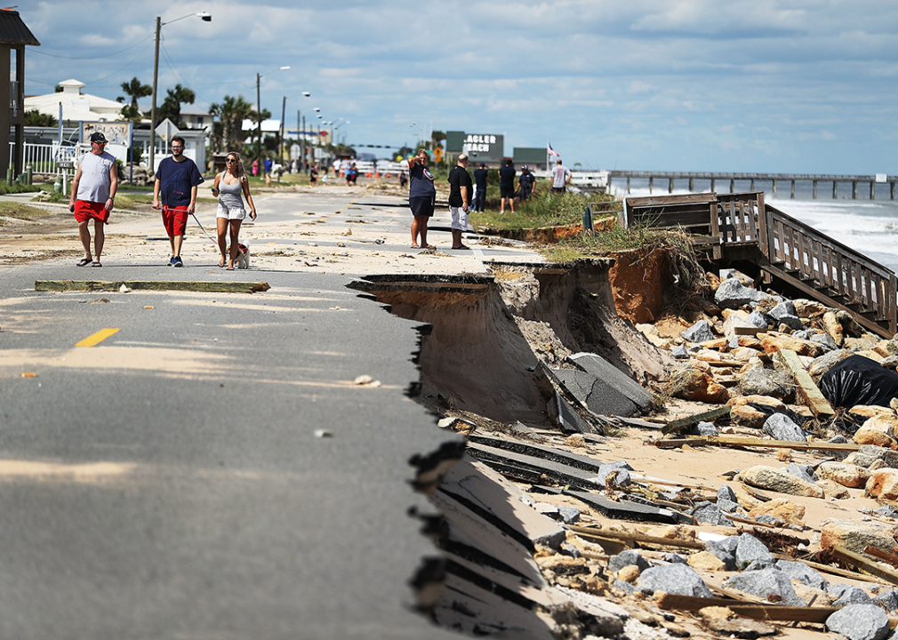 People survey damage in Flagler Beach.
