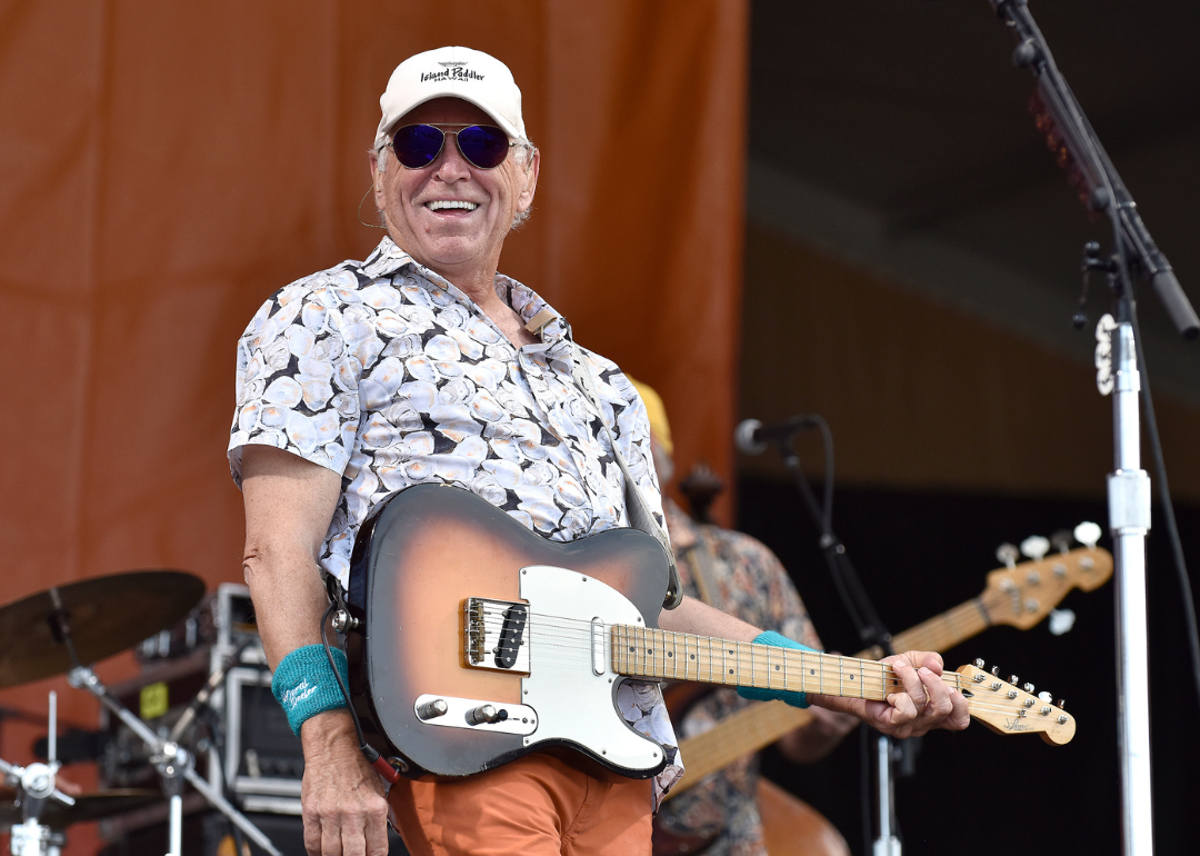 Jimmy Buffett performs onstage.