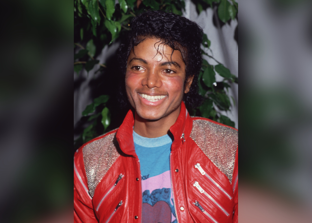 Michael Jackson smiles for photographer.