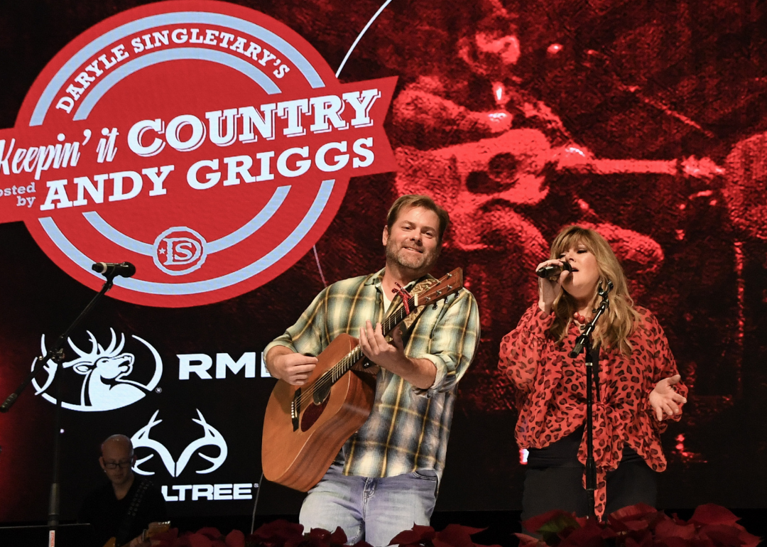 Andy Griggs and Jamie O'Neal perform at National Finals Rodeo show.