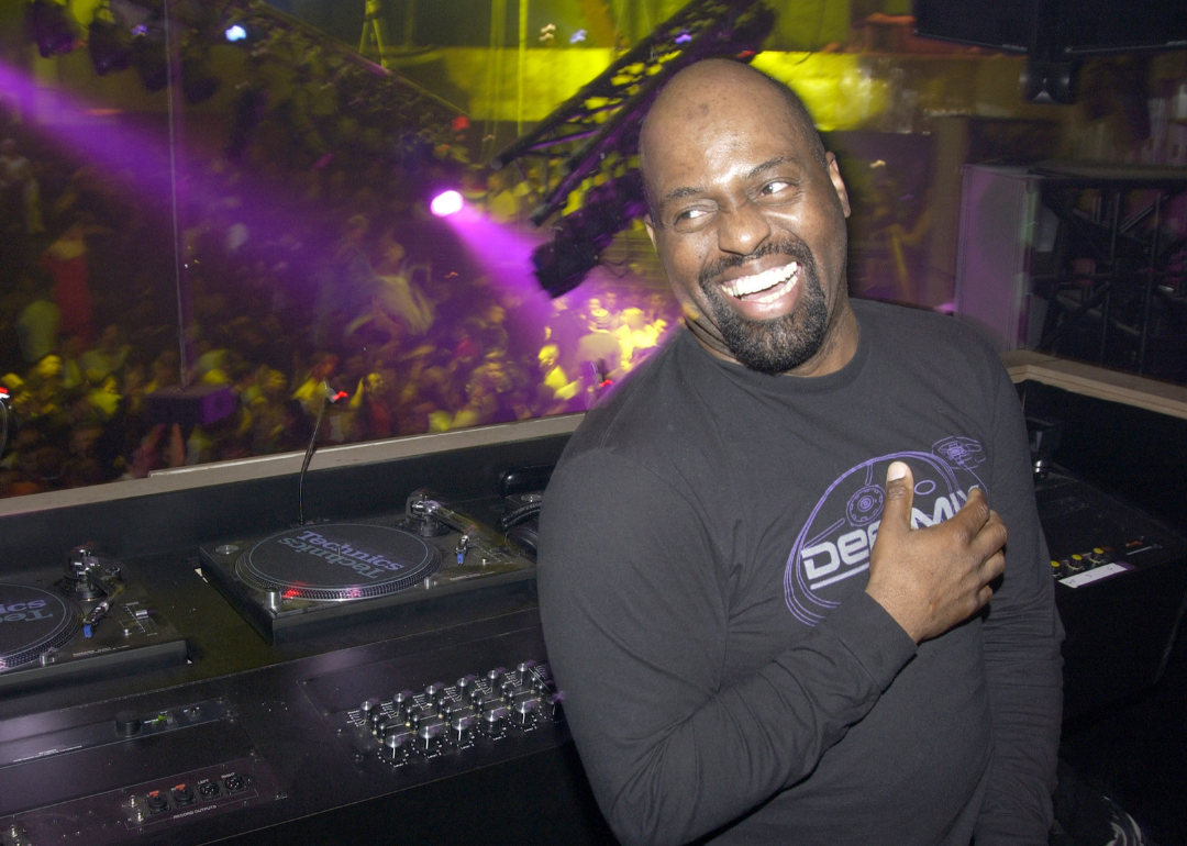 Frankie Knuckles in DJ booth.