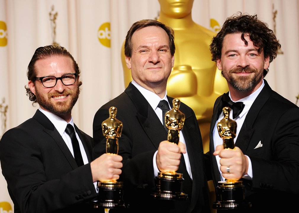 Alex Henning, Rob Legato, and Ben Grossman, winners of the Visual Effects Award for ‘Hugo'.