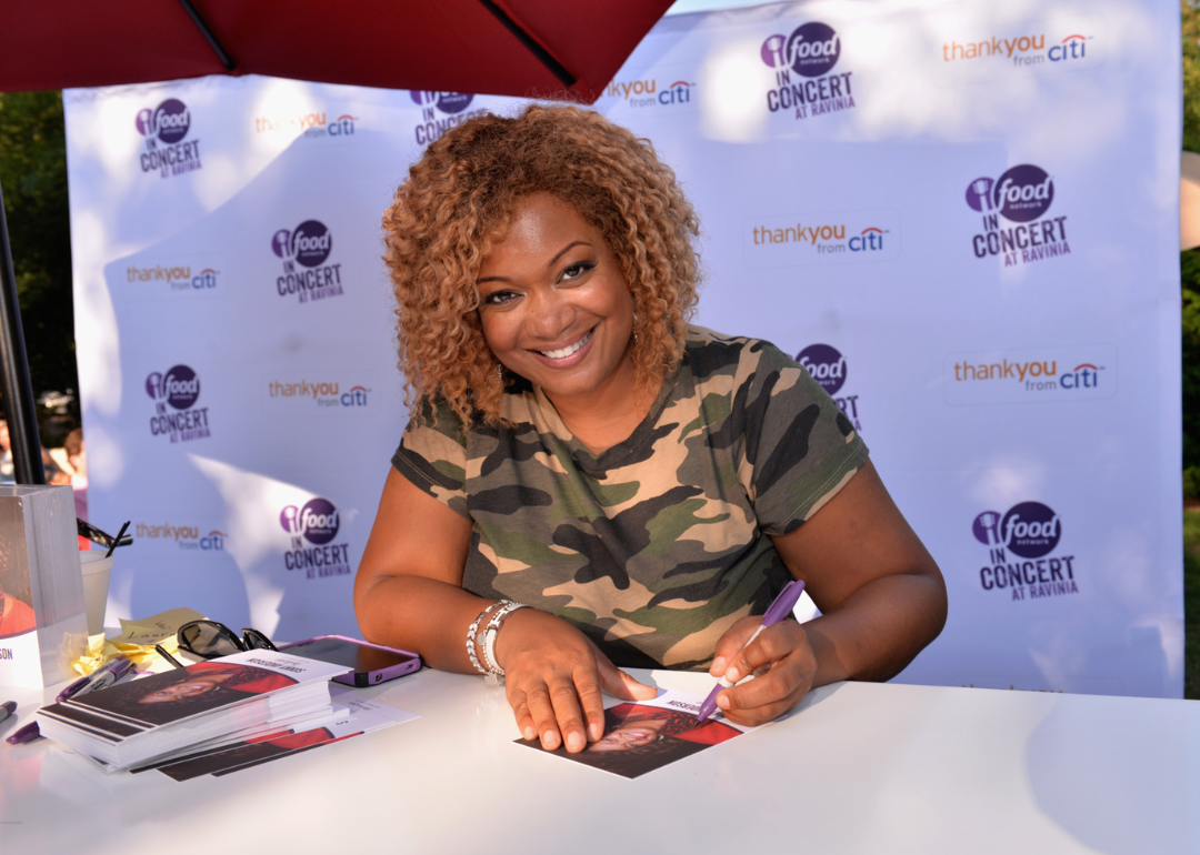 Sunny Anderson poses at food festival.