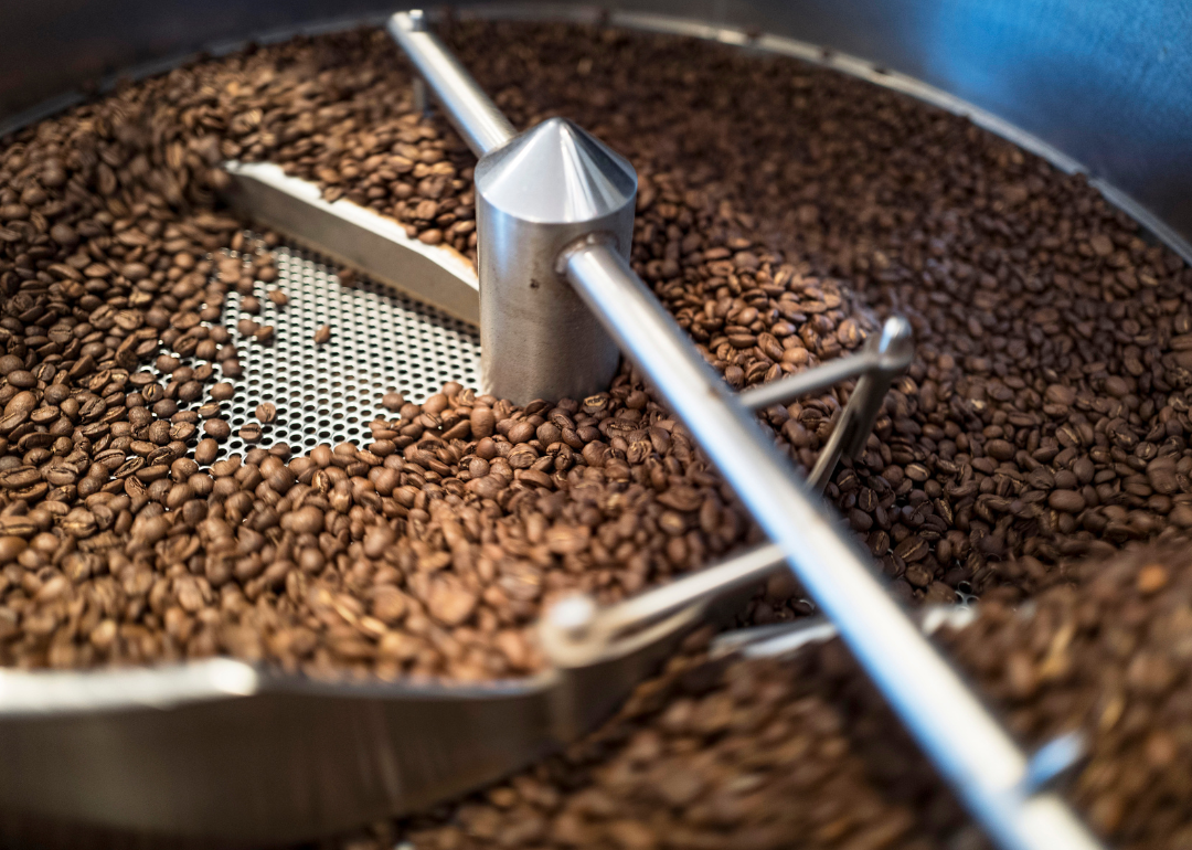 Freshly roasted coffee beans being cooled.