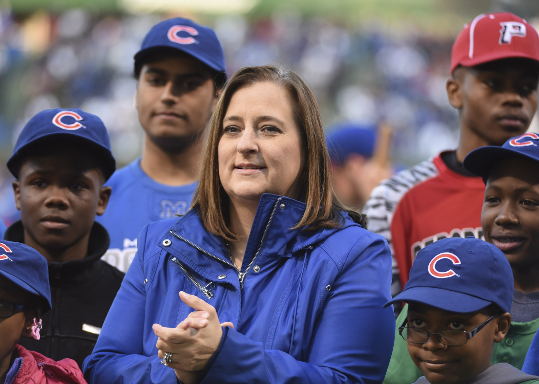 Laura Ricketts claps during a Chicago Cubs baseball game.