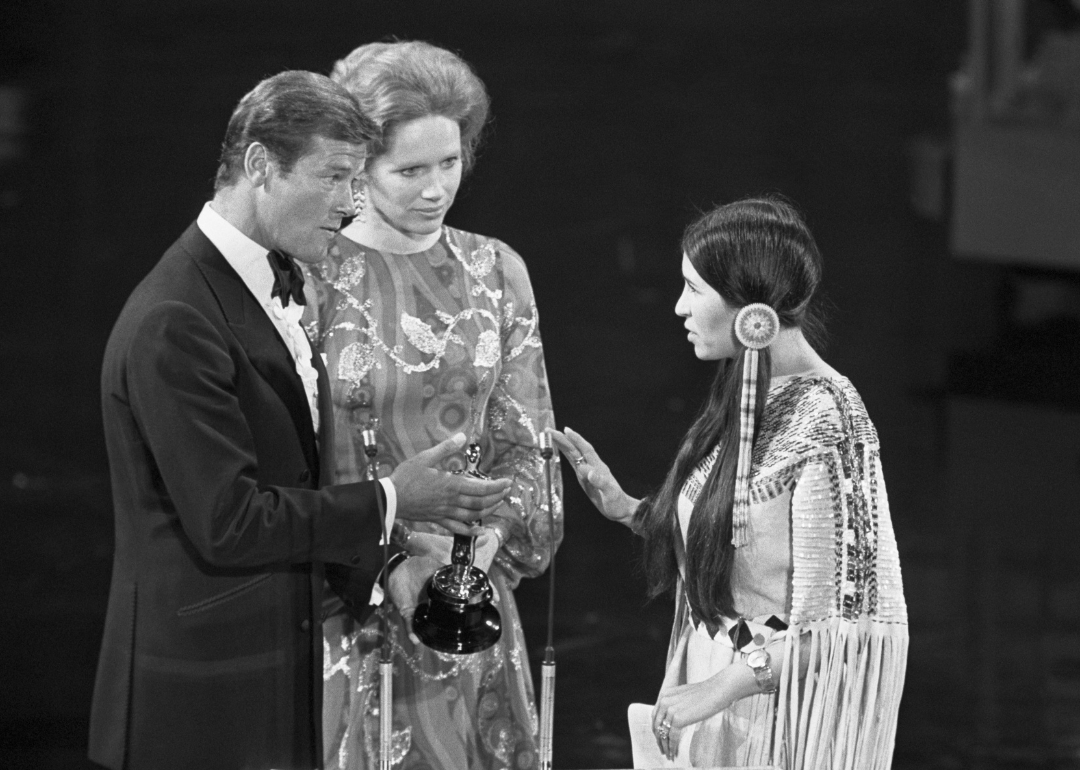 Sacheen Littlefeather on stage at Academy Award ceremony.