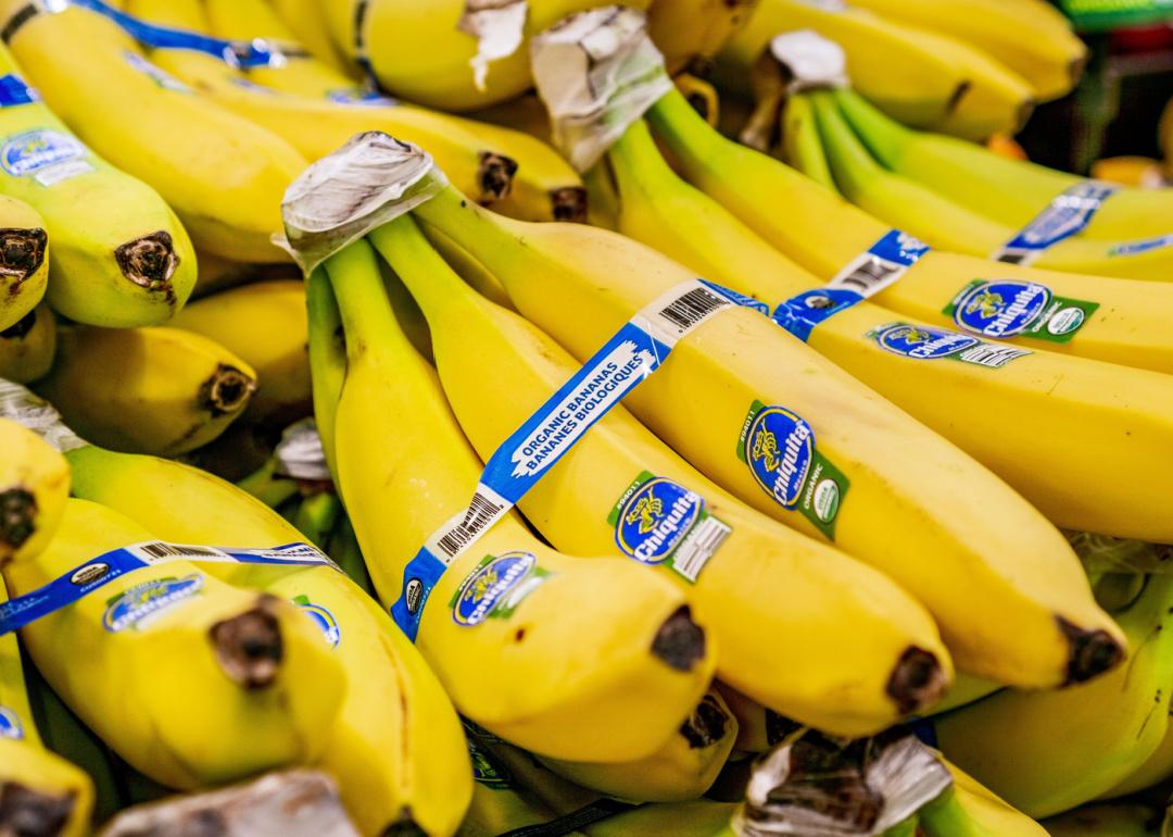 Bundles of Chiquita bananas in supermarket.