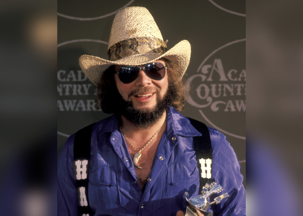 Hank Williams Jr poses with Academy of Country Music Award.