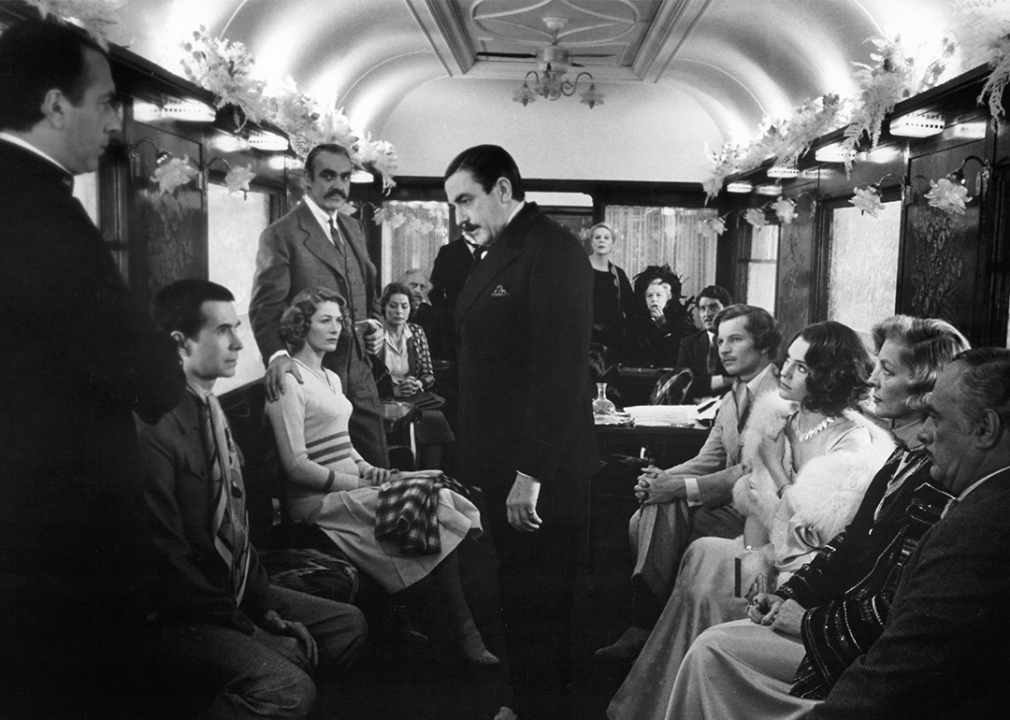 Albert Finney questions passengers in a scene from the film 