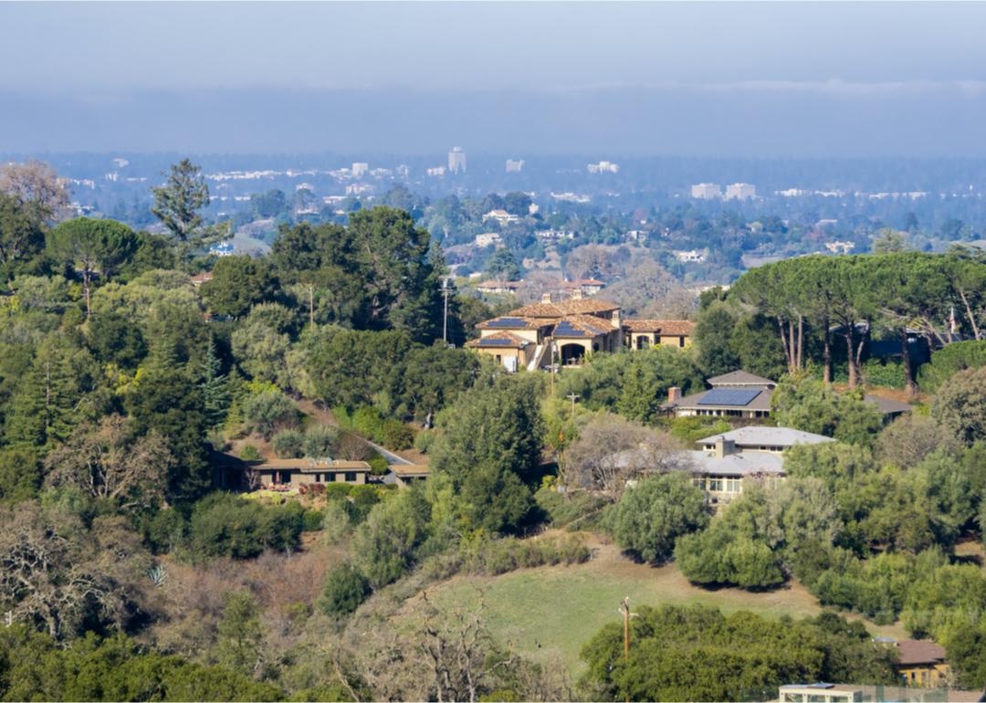 Aerial view hilltop homes.