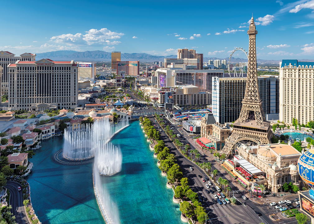 Elevated view of the Las Vegas strip with mountains in background.