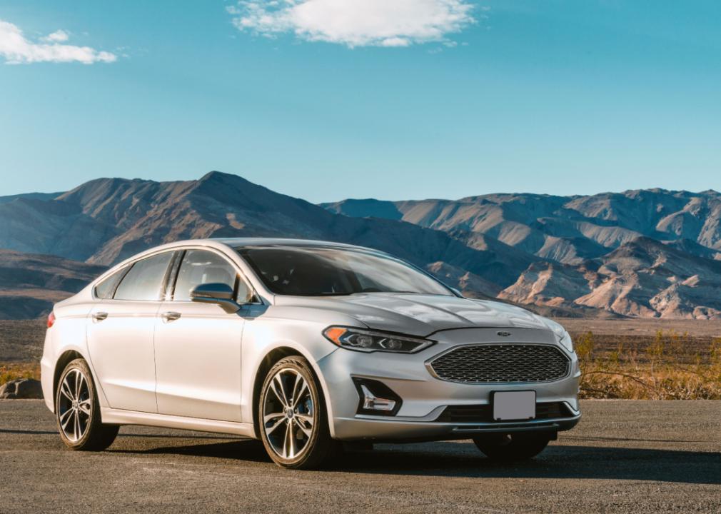 2018 Ford Fusion with a mountain background.