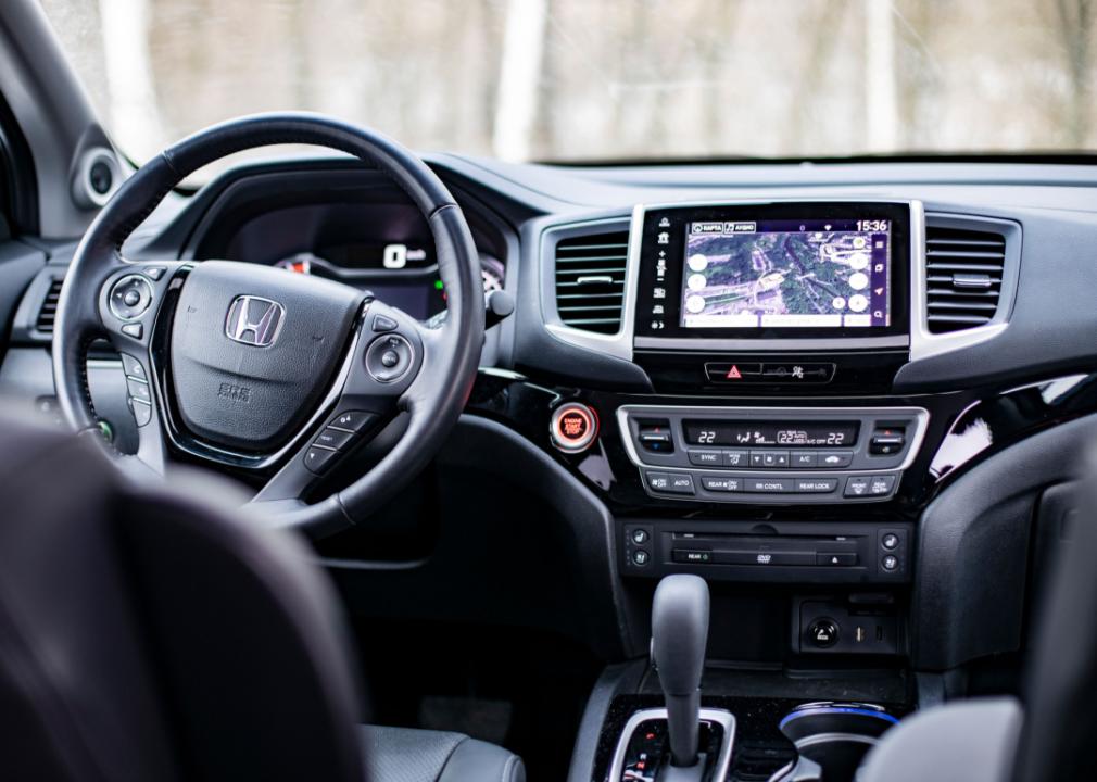 2020 Honda Pilot driver seat, steering wheel, and control panel.