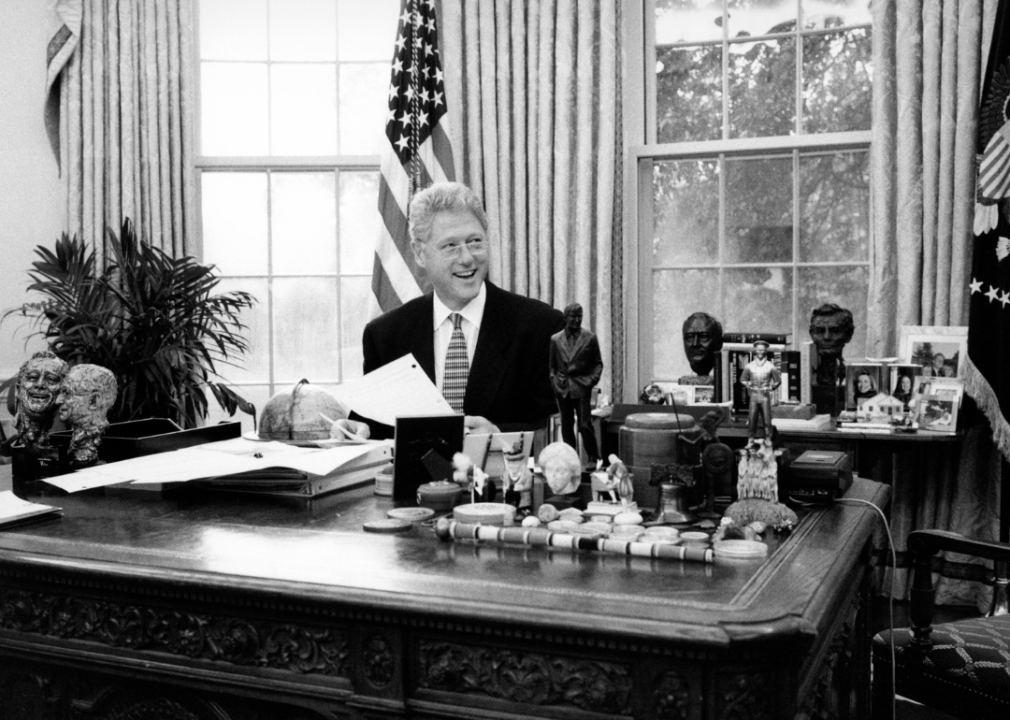 President Bill Clinton at his desk in the Oval Office in 1996