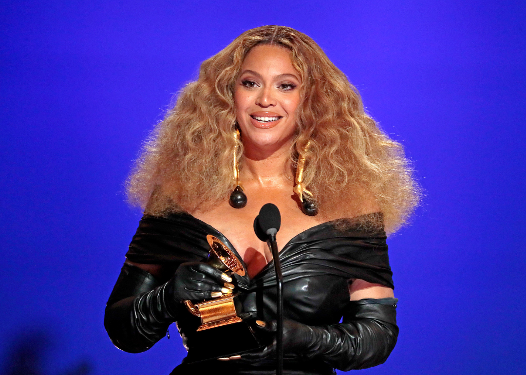 Beyonce accepts an award at the 2021 Grammys