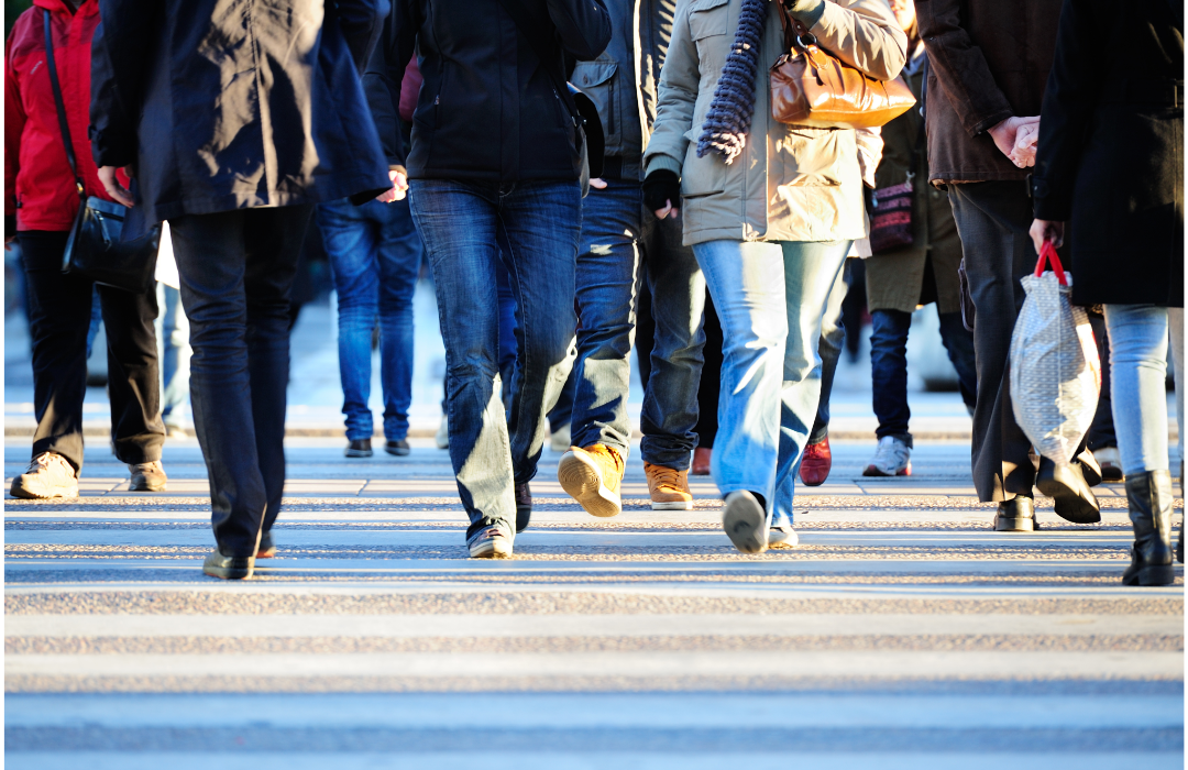 A group of pedestrians crossing the road