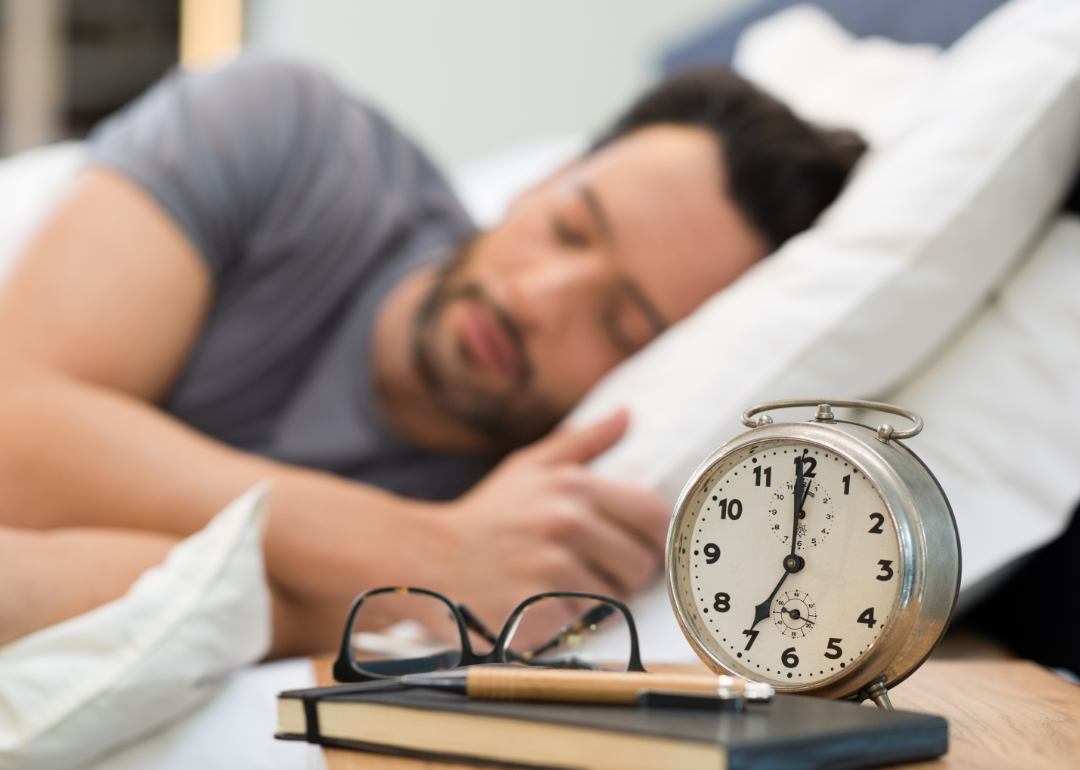 A man asleep in bed