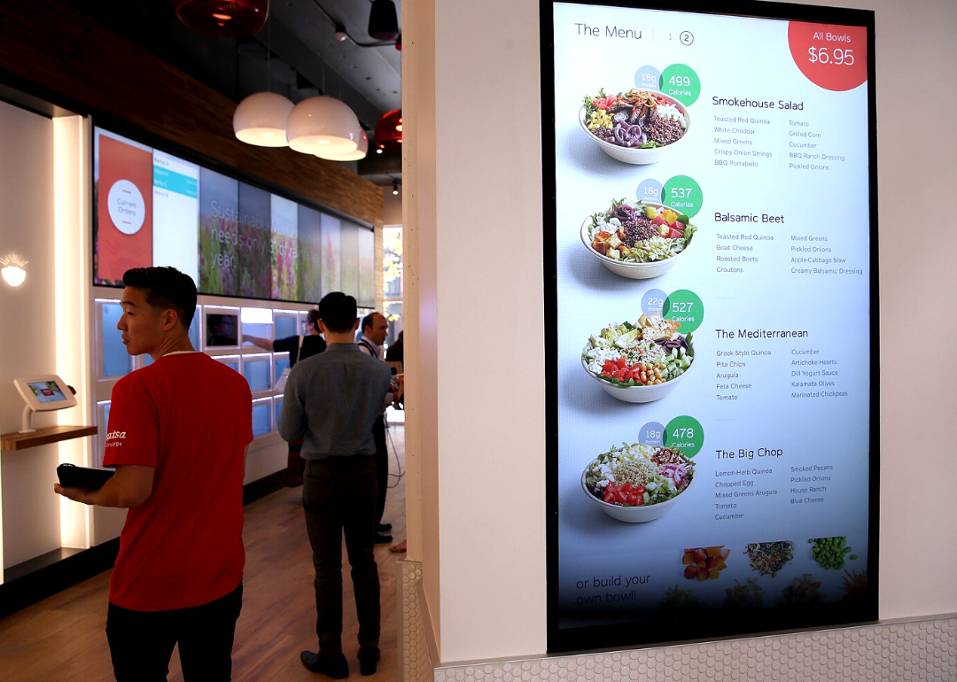 A menu on a large screen is displayed at a fully automated fast food restaurant in San Francisco.