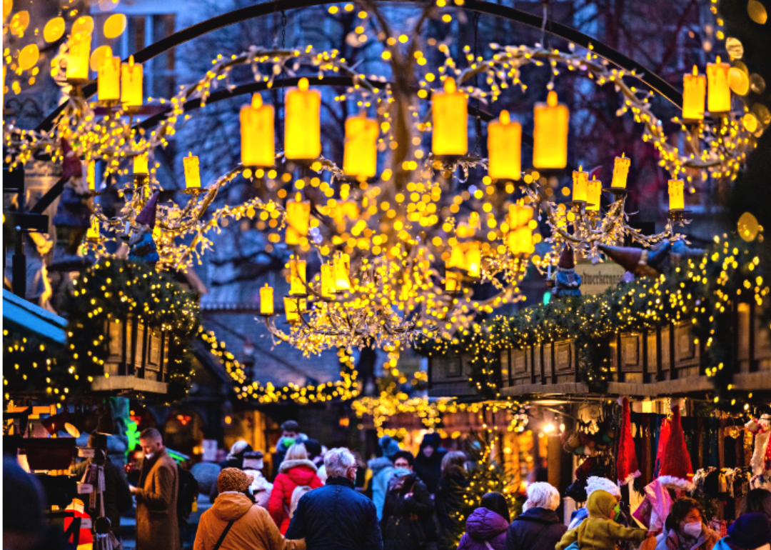 Visitors walk through the Christmas market in Cologne.