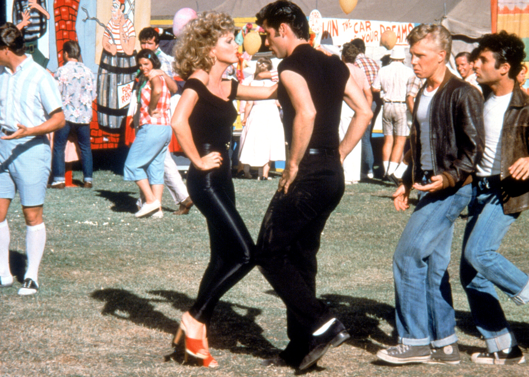 Olivia Newton-John and John Travolta in a scene from ‘Grease.'