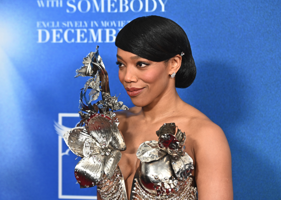 Naomi Ackie in a silver gown.