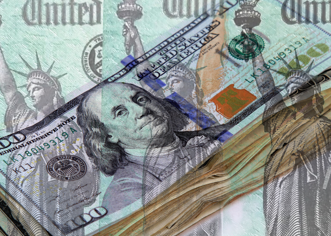 Conceptual, layered image of U.S. currency and the Treasury.