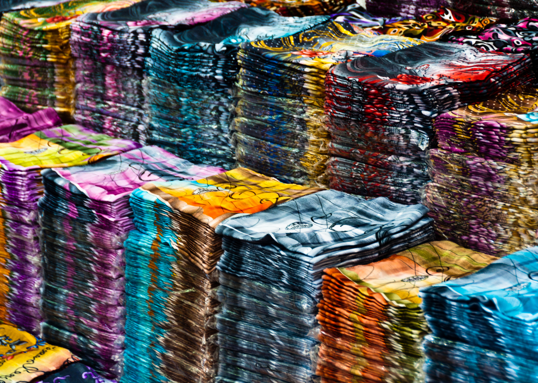 Stacks of folded cloth material.