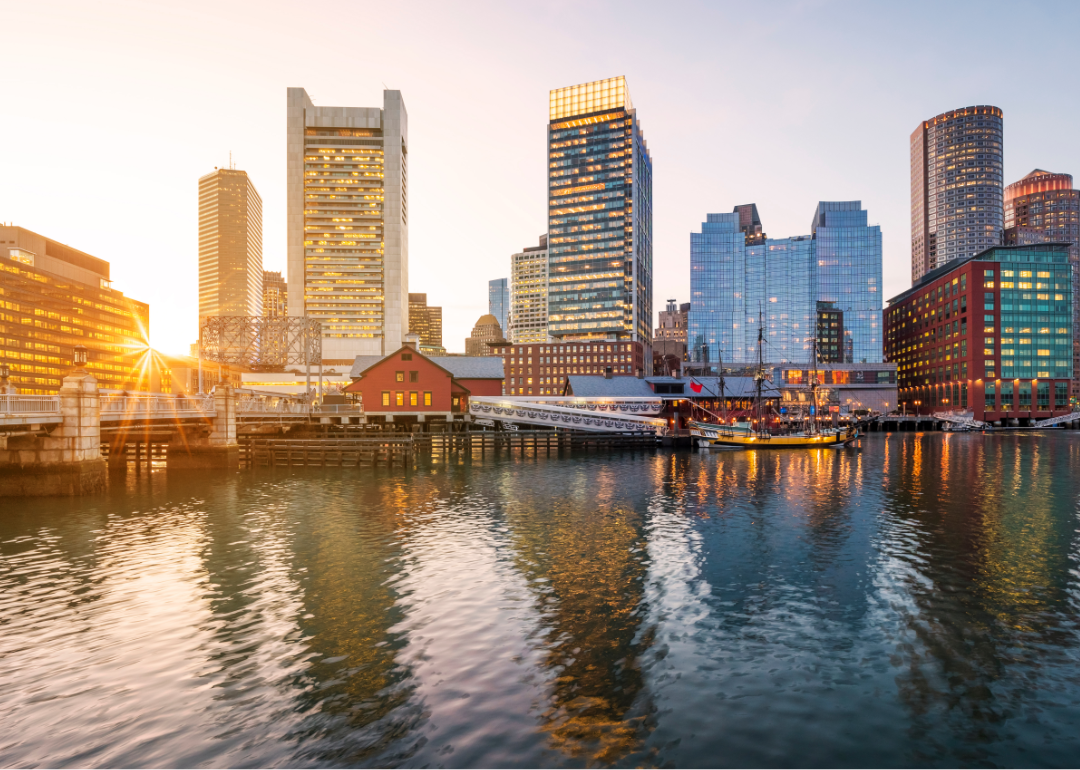 The sun setting behind the Boston piers.