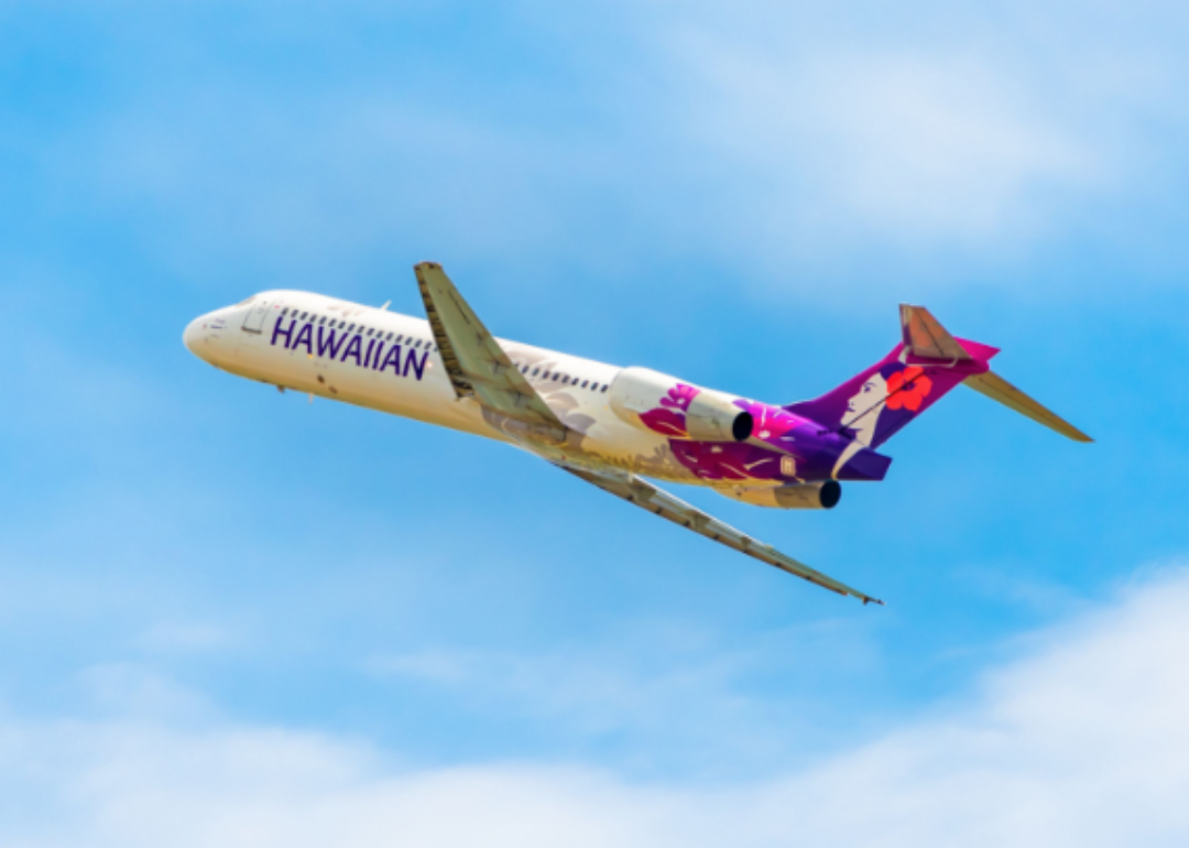 A Hawaiian Airlines jet in the sky.