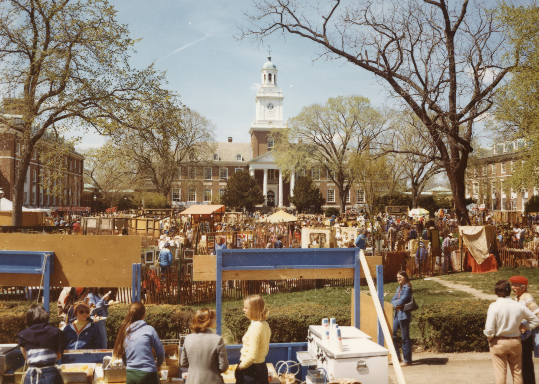 A busy Spring Fair on Keyser Quad in front of Gilman Hall at Johns Hopkins University, Baltimore in April 1978.