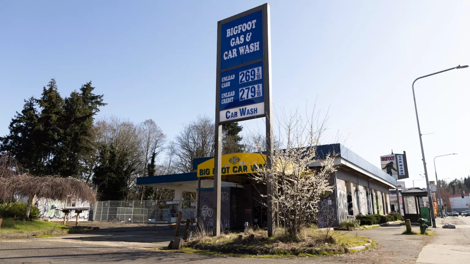 A sign advertises the Bigfoot gas station and car wash.