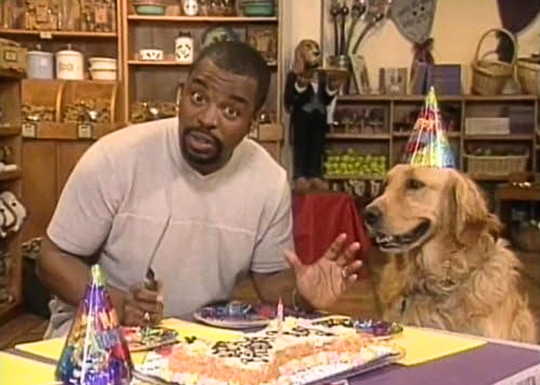 LeVar Burton and a dog in a scene from Reading Rainbow.
