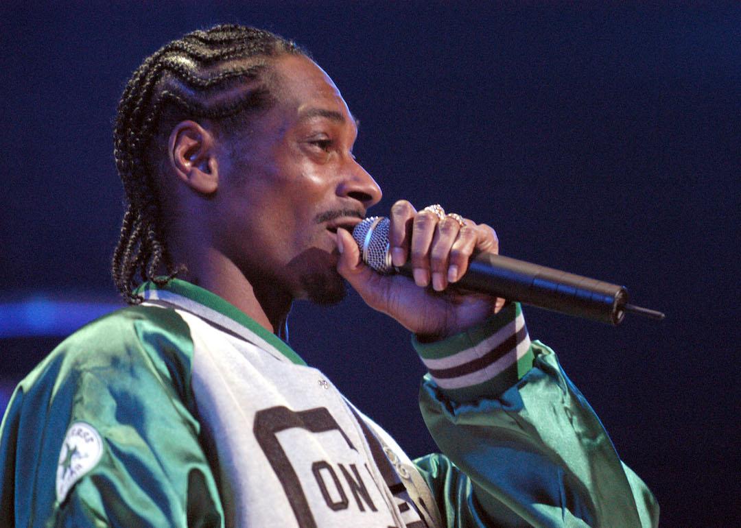 Snoop Dogg performing onstage.