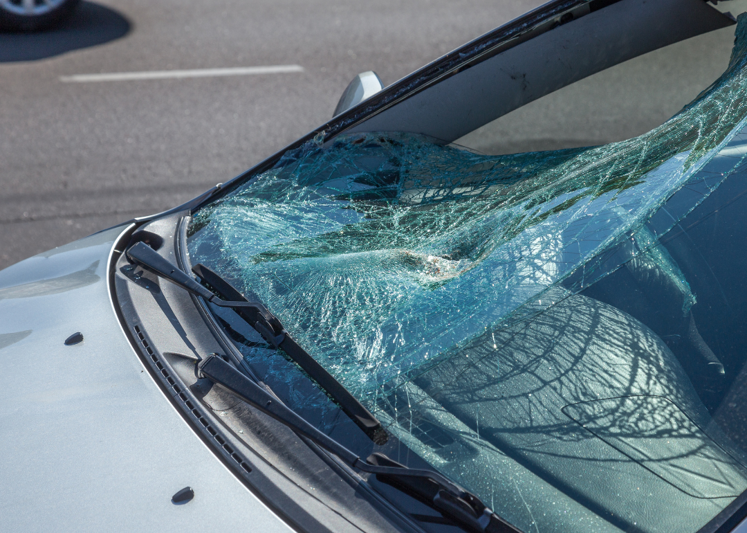 Close up of a broken windshield.