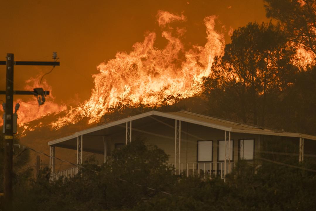 The French Fire comes close to destroying homes on August 24, 2021 in Wofford Heights, California. 