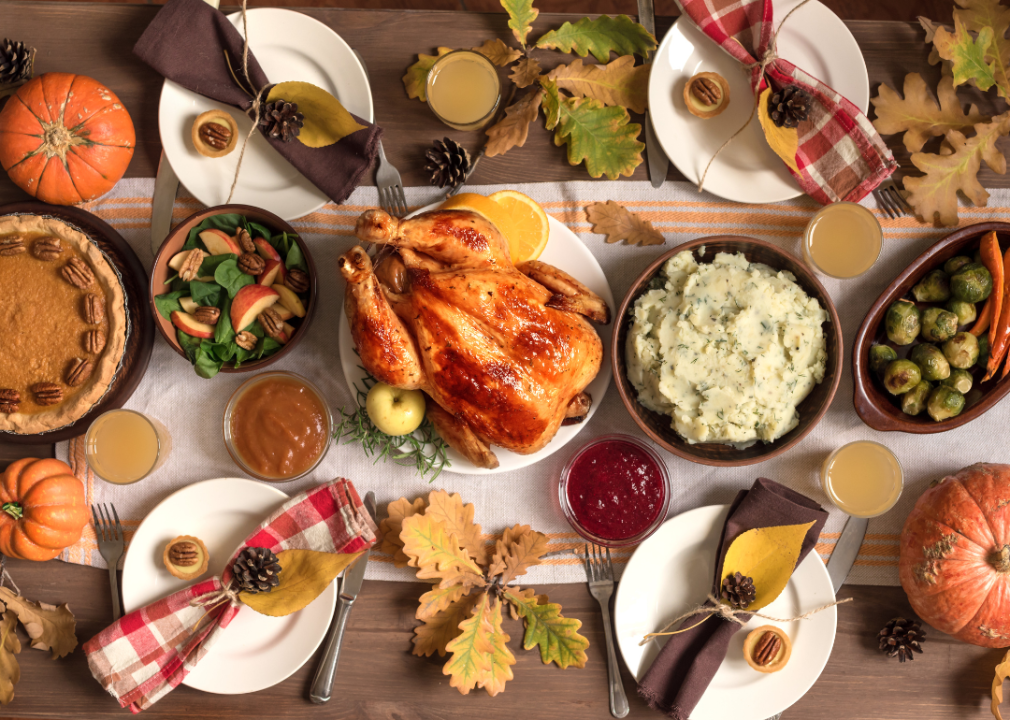 A Thanksgiving meal laid out on a wooden table