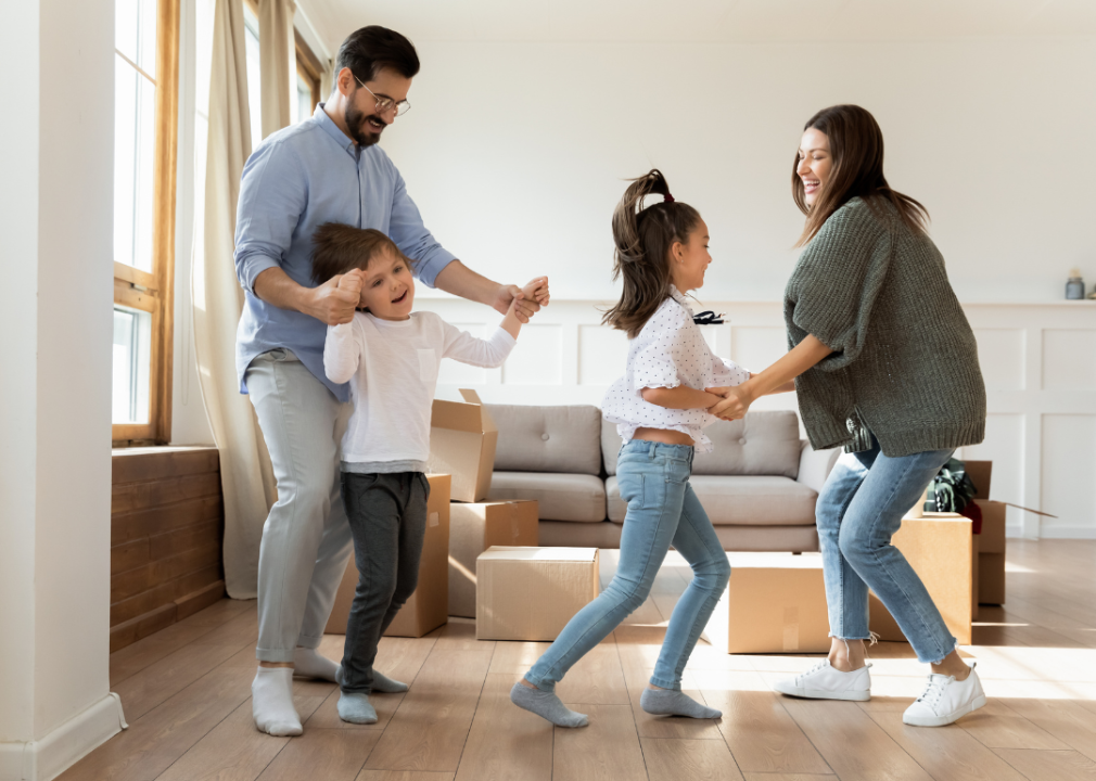 A family celebrates moving into a new home