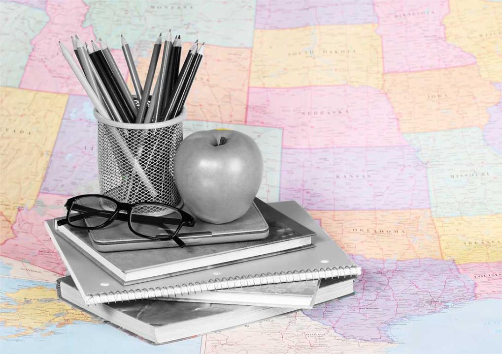 photo illustration U.S map with grayscale teaching materials placed on topced 