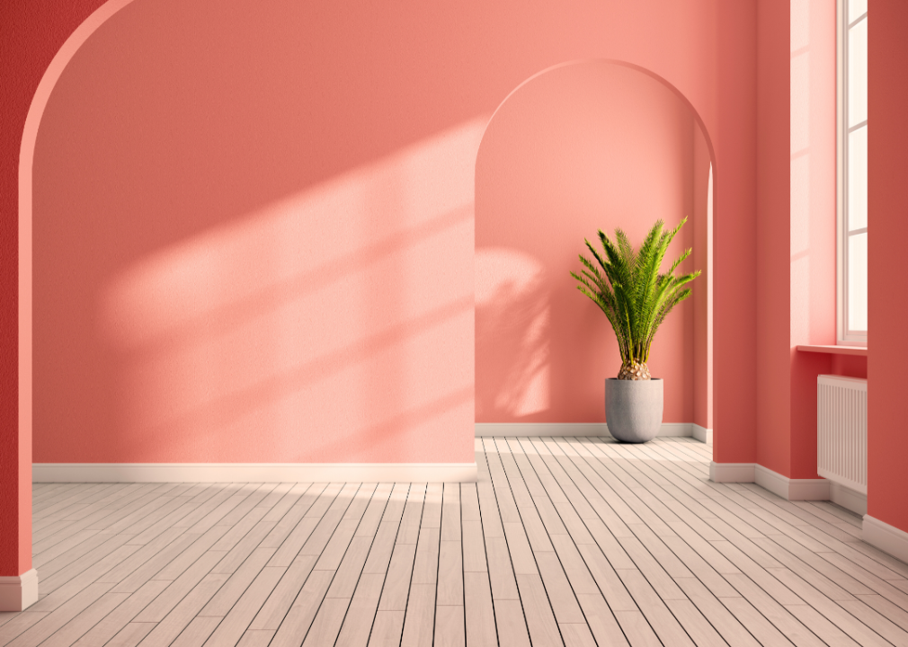 A pink room decorated in a modern style