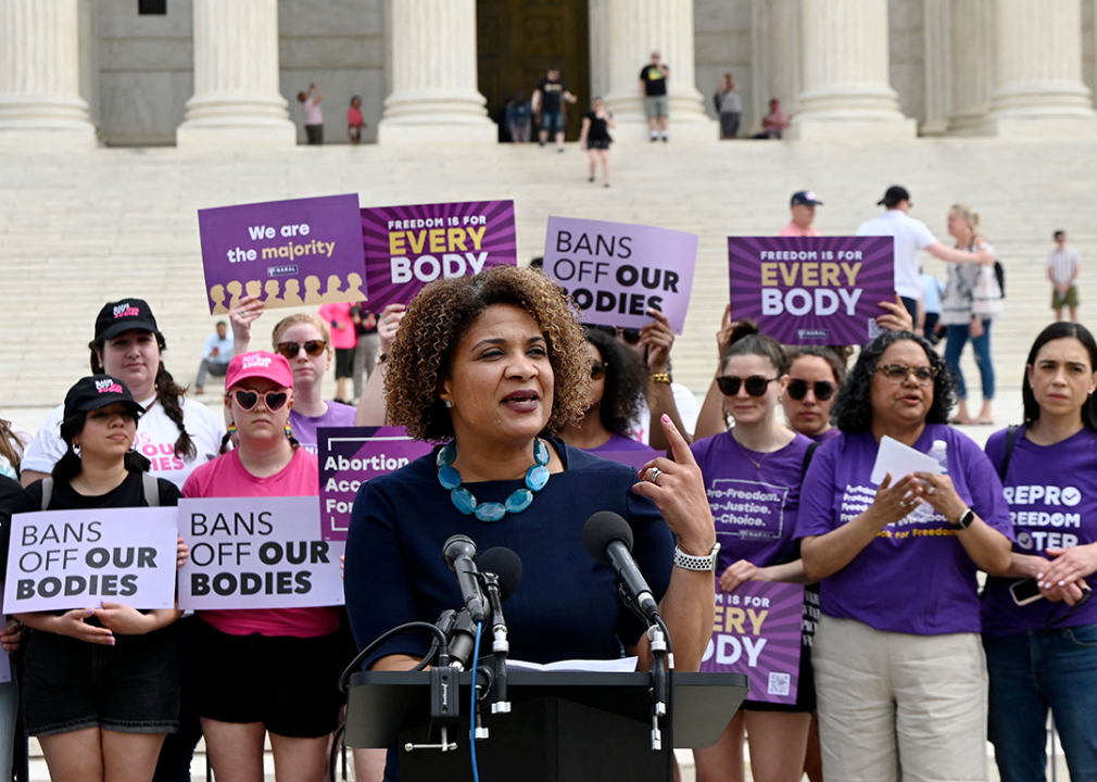 Fatima Goss-Graves speaks to abortion rights advocates as they rally outside the U.S. Supreme Court.