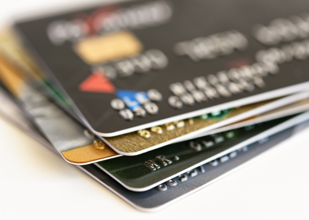 A slightly blurred stack of fanned out credit cards