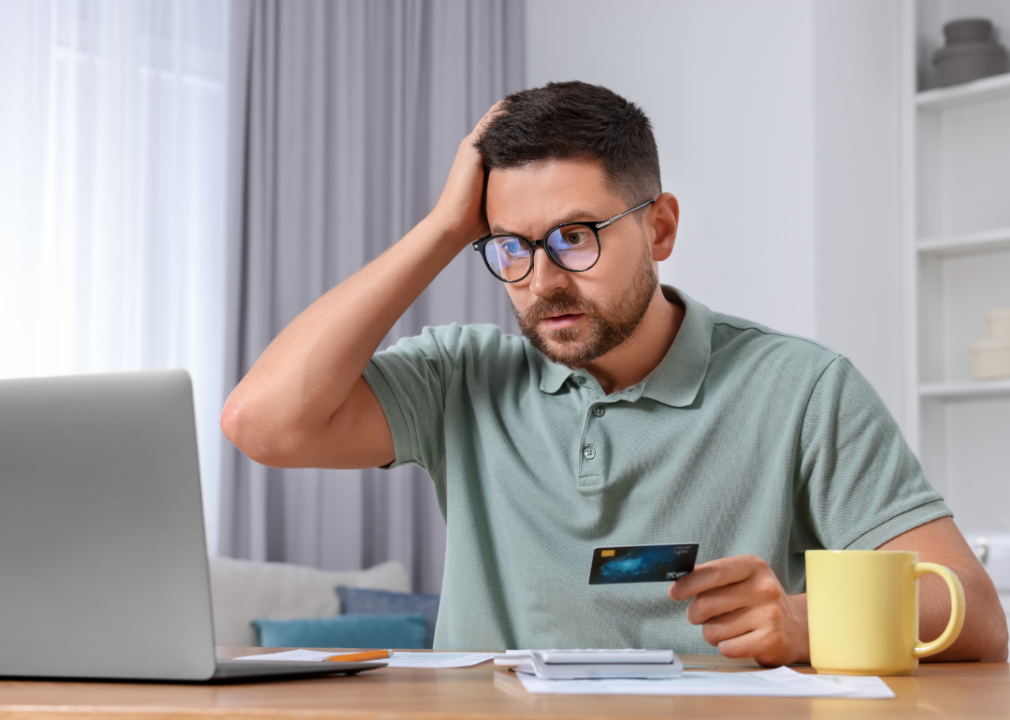man paying online with credit card