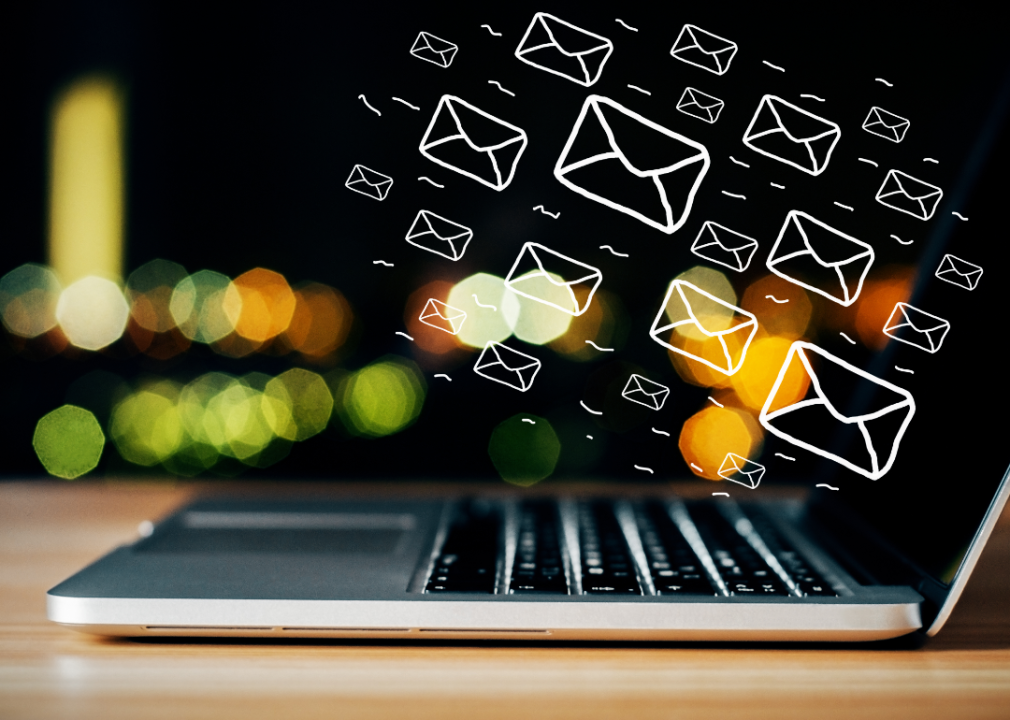 Illustration of email envelopes floating out of a laptop.