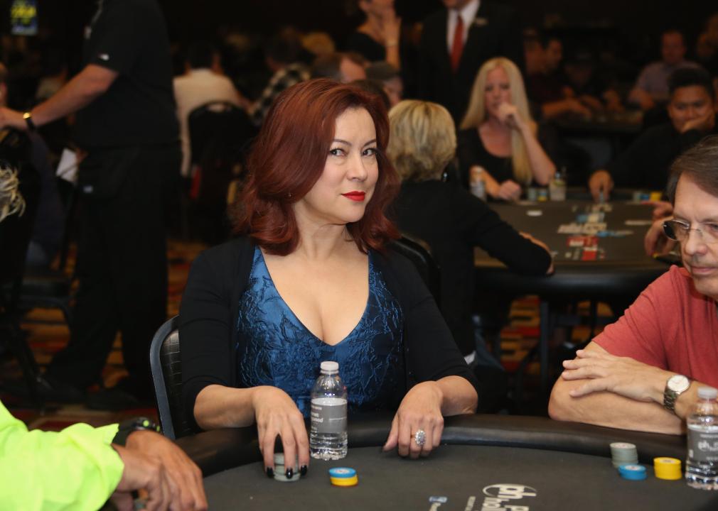 Jennifer Tilly at a poker table.