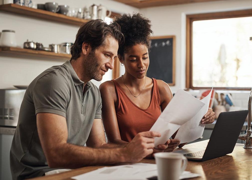 couple going over finances on computer