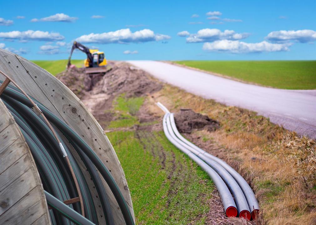 Earth digger used to dig down cables for broadband connection in rural area