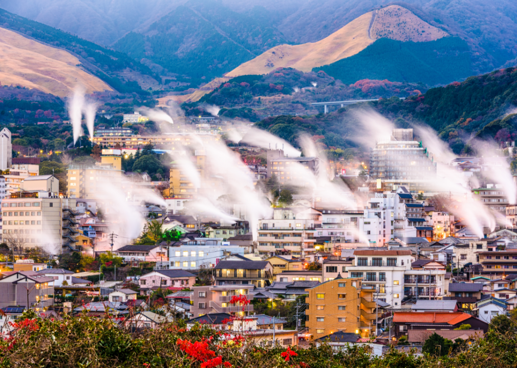 Beppu, Japan cityscape with hot spring bath houses with rising steam